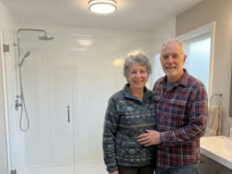 A couple in their remodeled bathroom